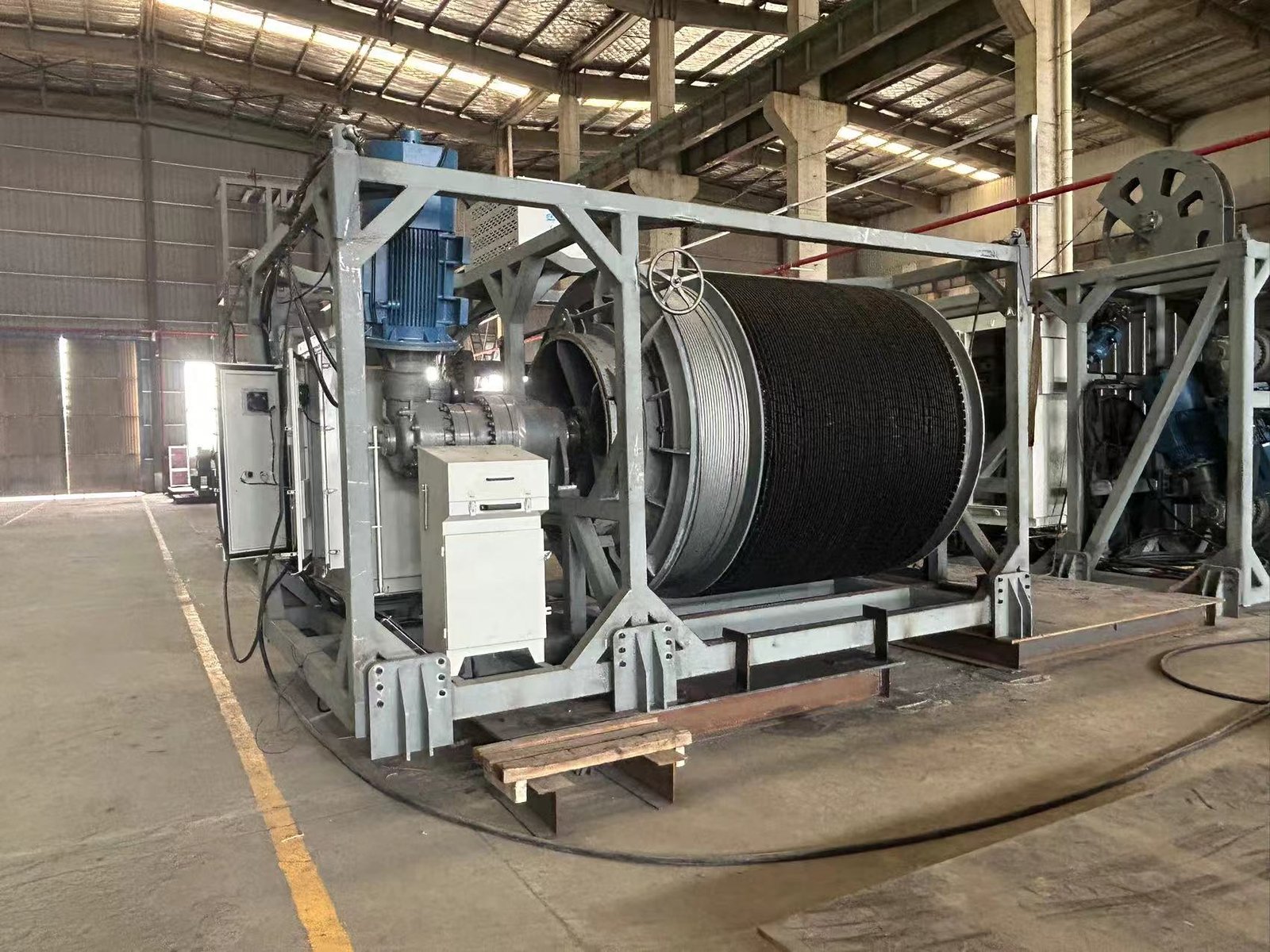 High-speed towing winch with faired cable, during assembly